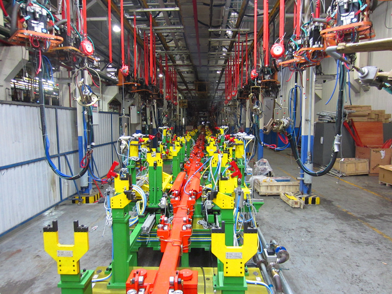 Reciprocating rod conveyor line